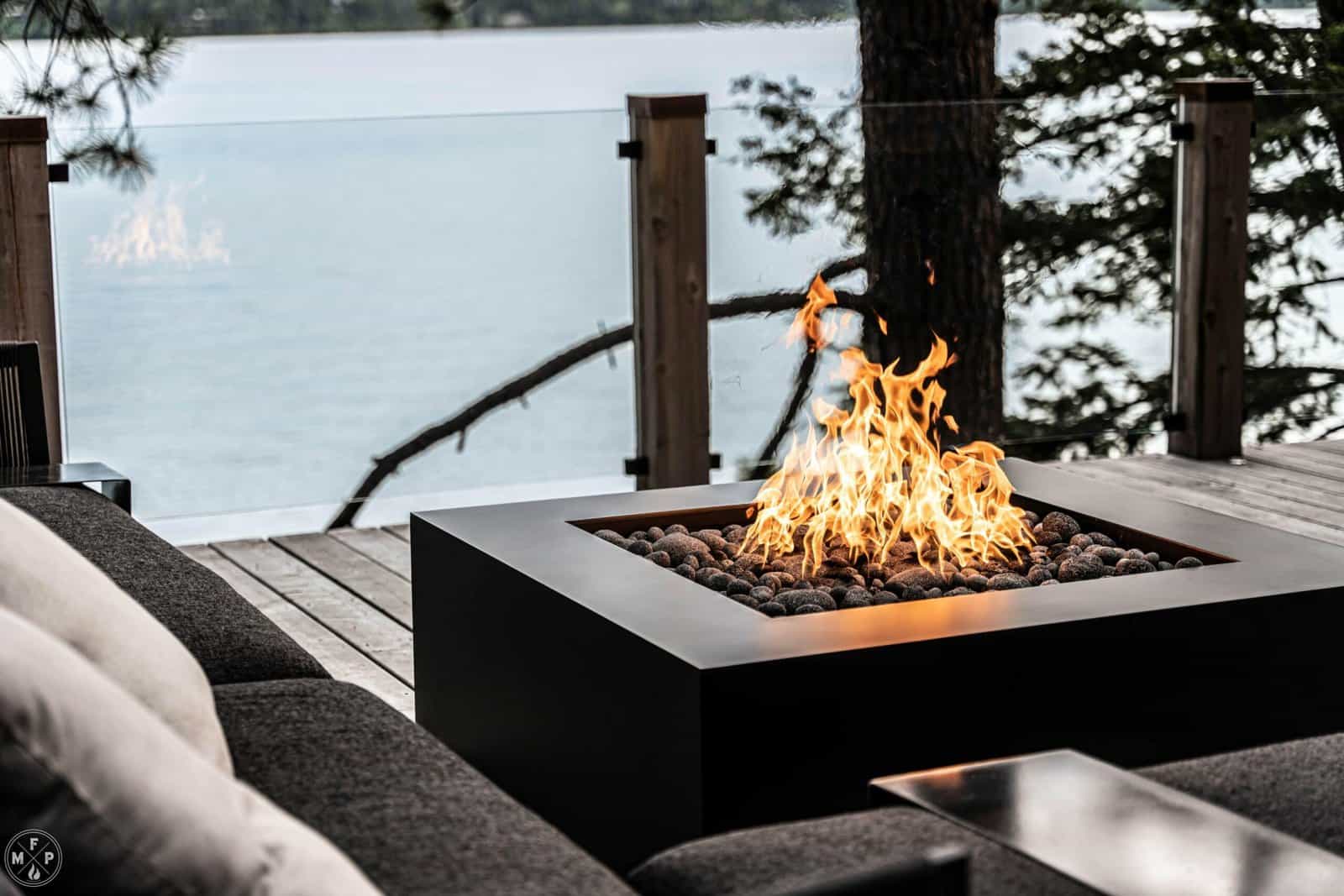 Outdoor square fire pit with open flame