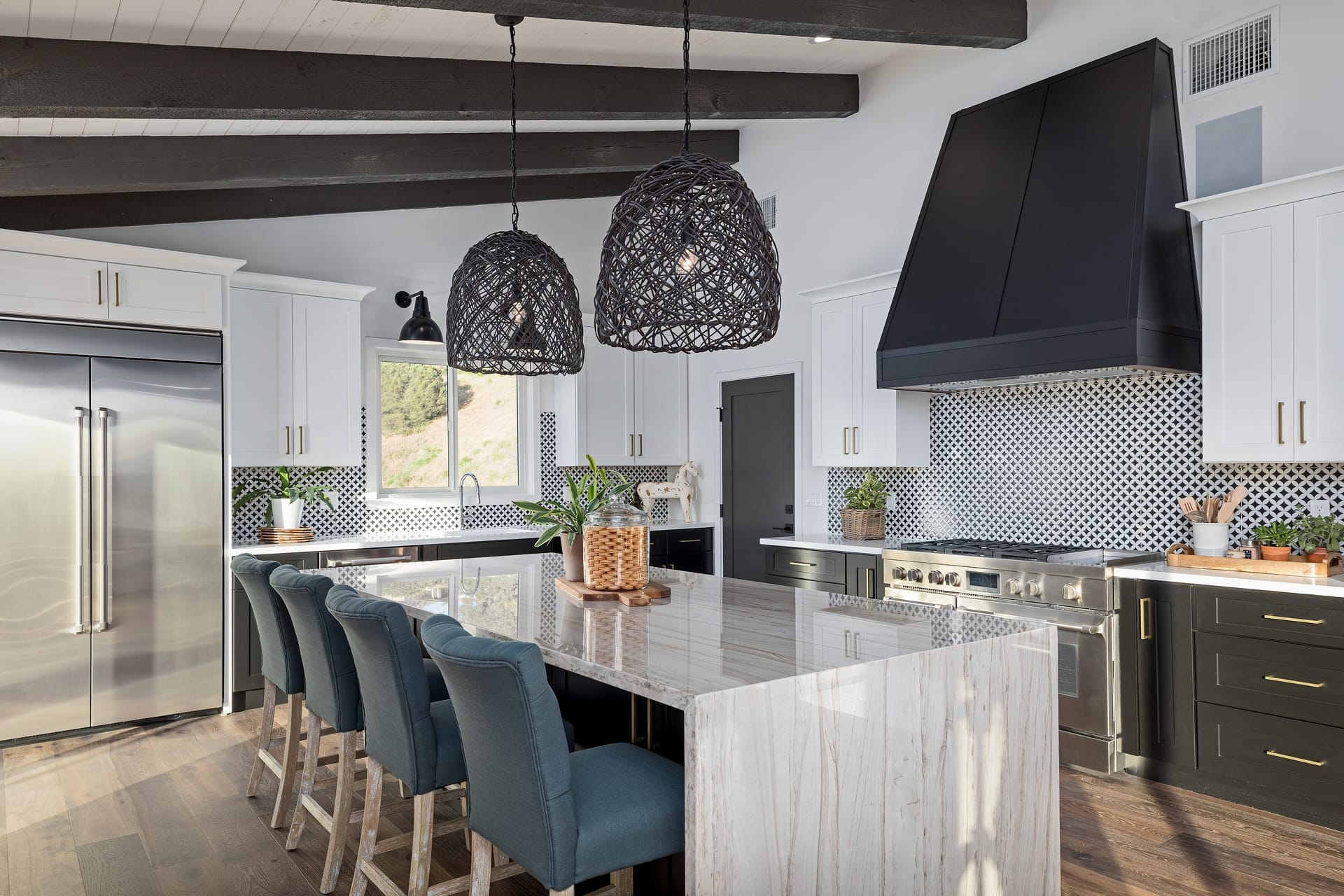Quartzite countertop island with modern kitchen cabinets